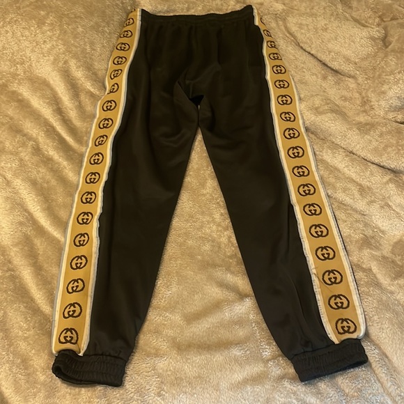 Gucci black joggers. Size Small. Black with Gucci stripe and reflective. - Picture 2 of 2